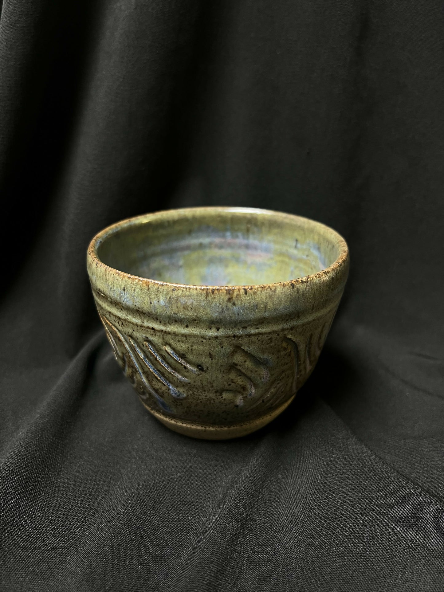 Pottery hand warm mug with blue green tones