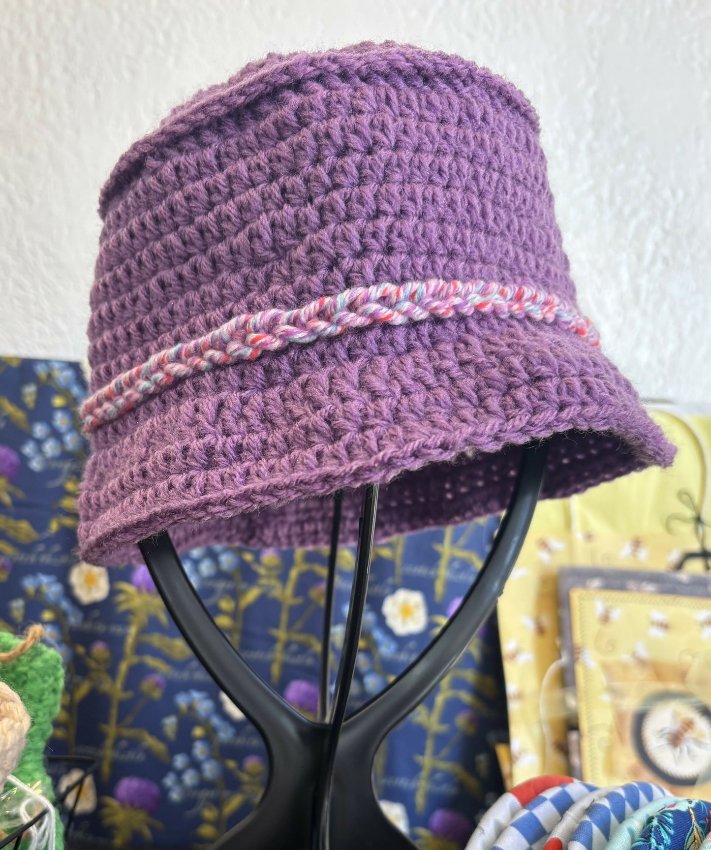 Purple crochet hat with pink band
