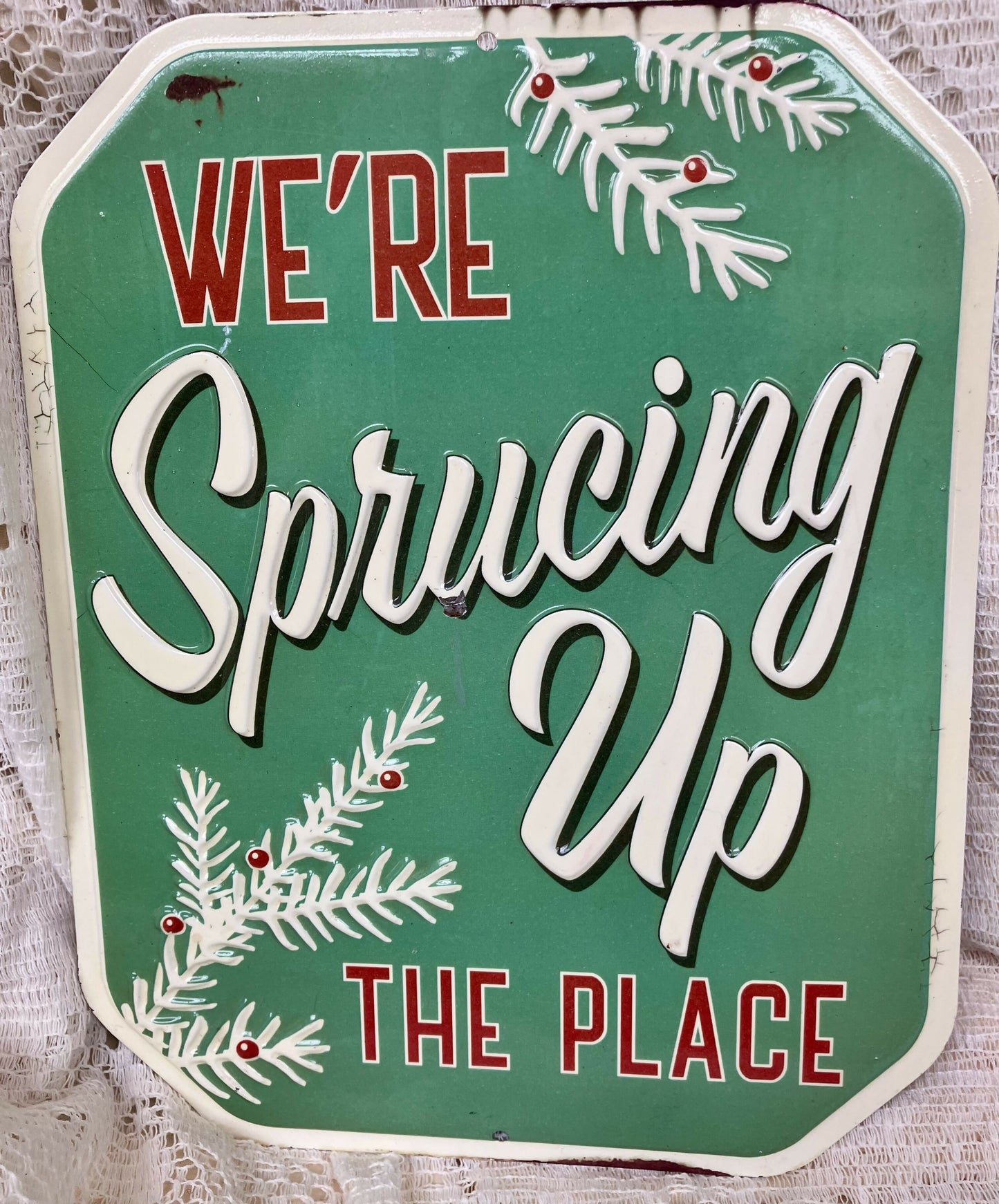 Sprucing up sign #1990