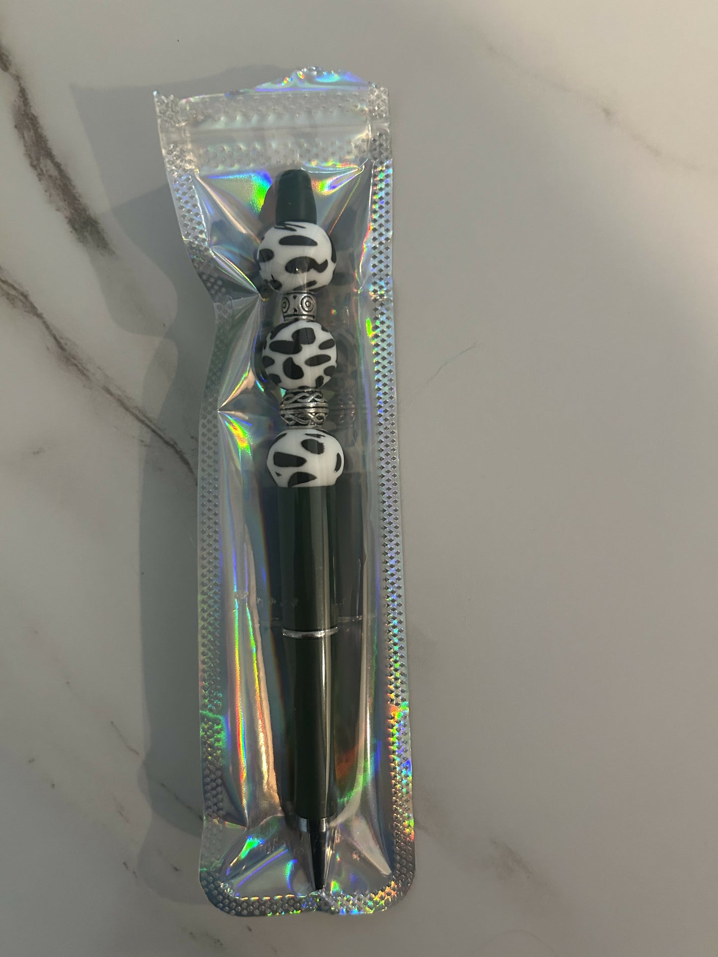 Black animal print pen