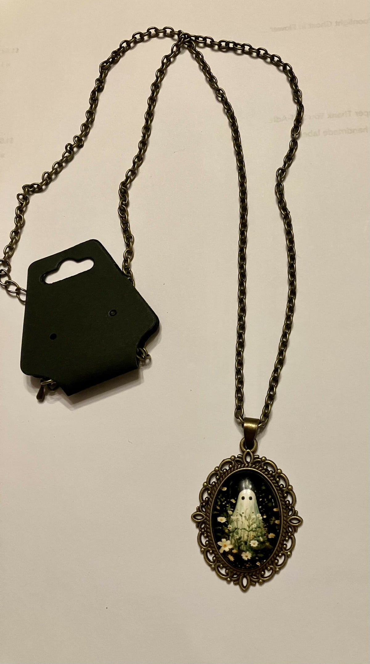 #3337 Ghost/flower necklace